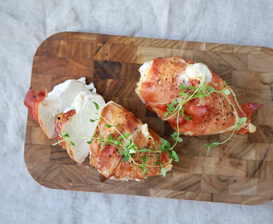 Chicken breast filled with garlic cream cheese. Best way to make a chicken breast fancy. Wrapped in Serrano ham for extra flavor