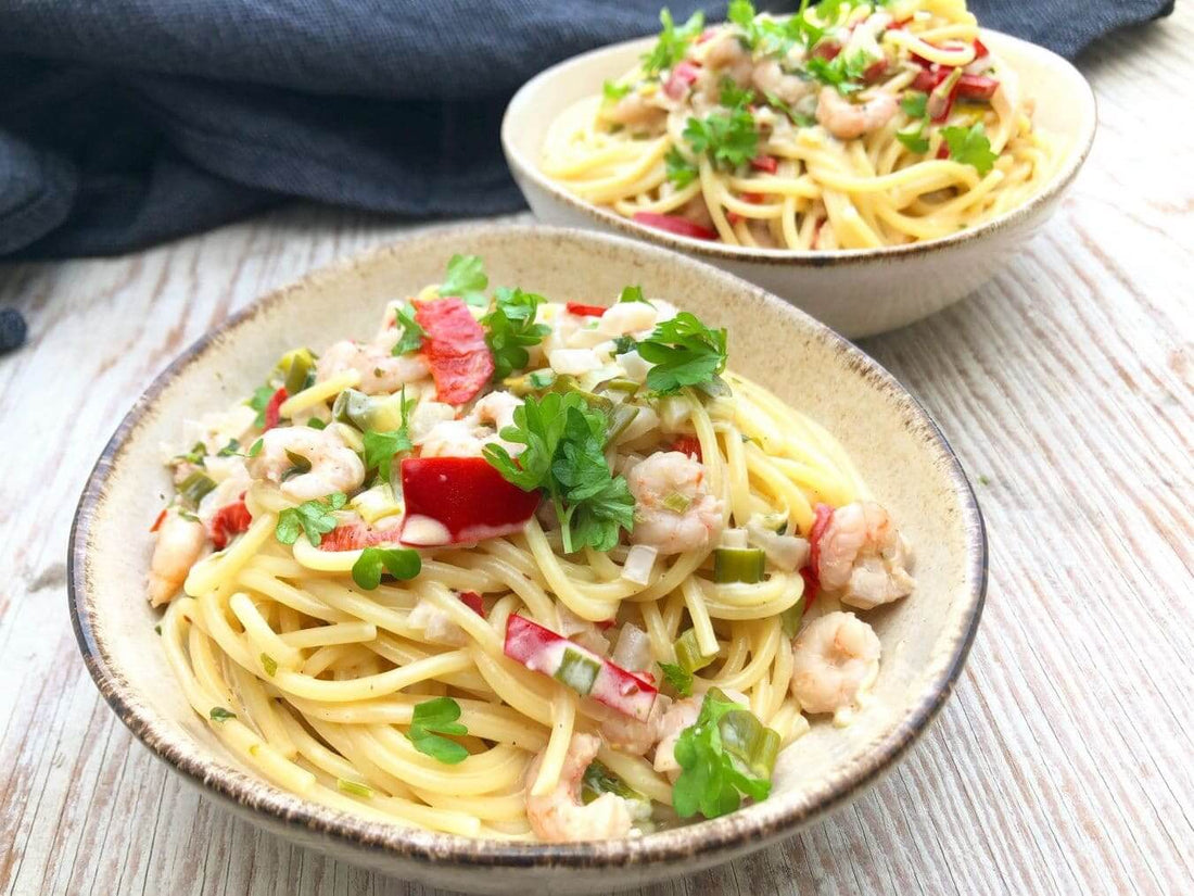 Easy pasta recipe for the entire family with seafood and white wine cream sauce
