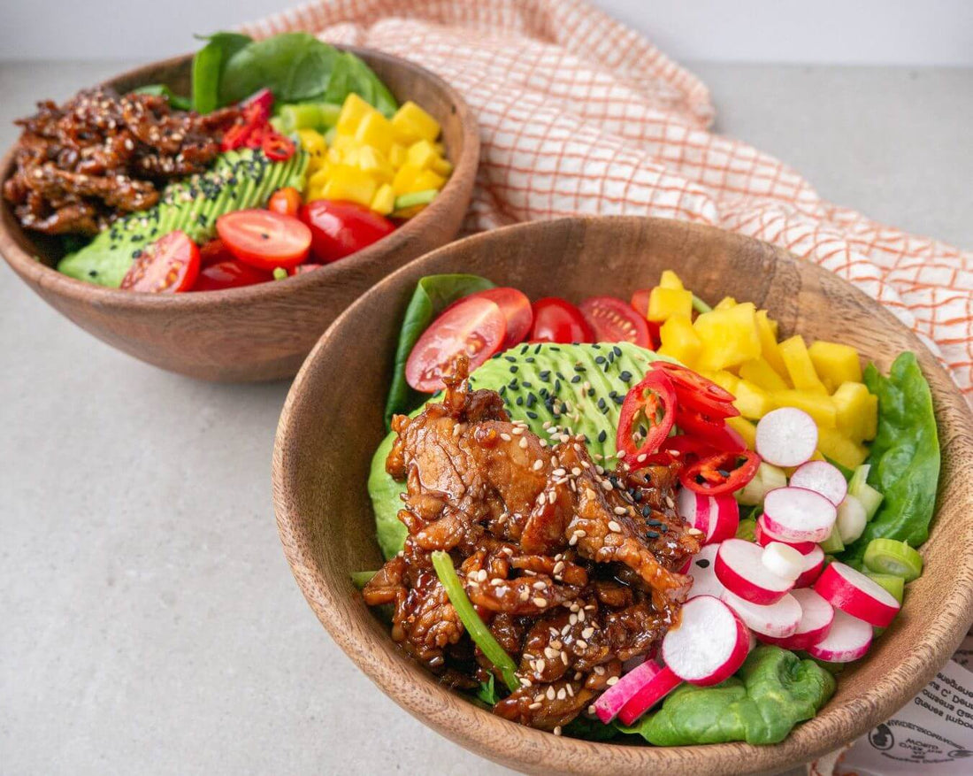 Healthy dinner ideas for salad bowls with Asian pork tenderloin slices