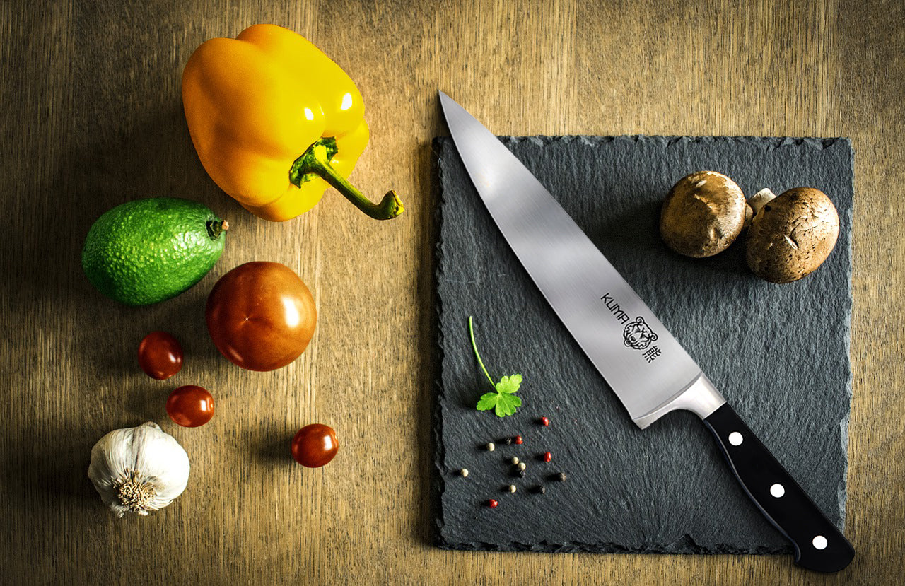 Chef Using Kinife The beginner’s guide to using a chef knife – KUMA Knives