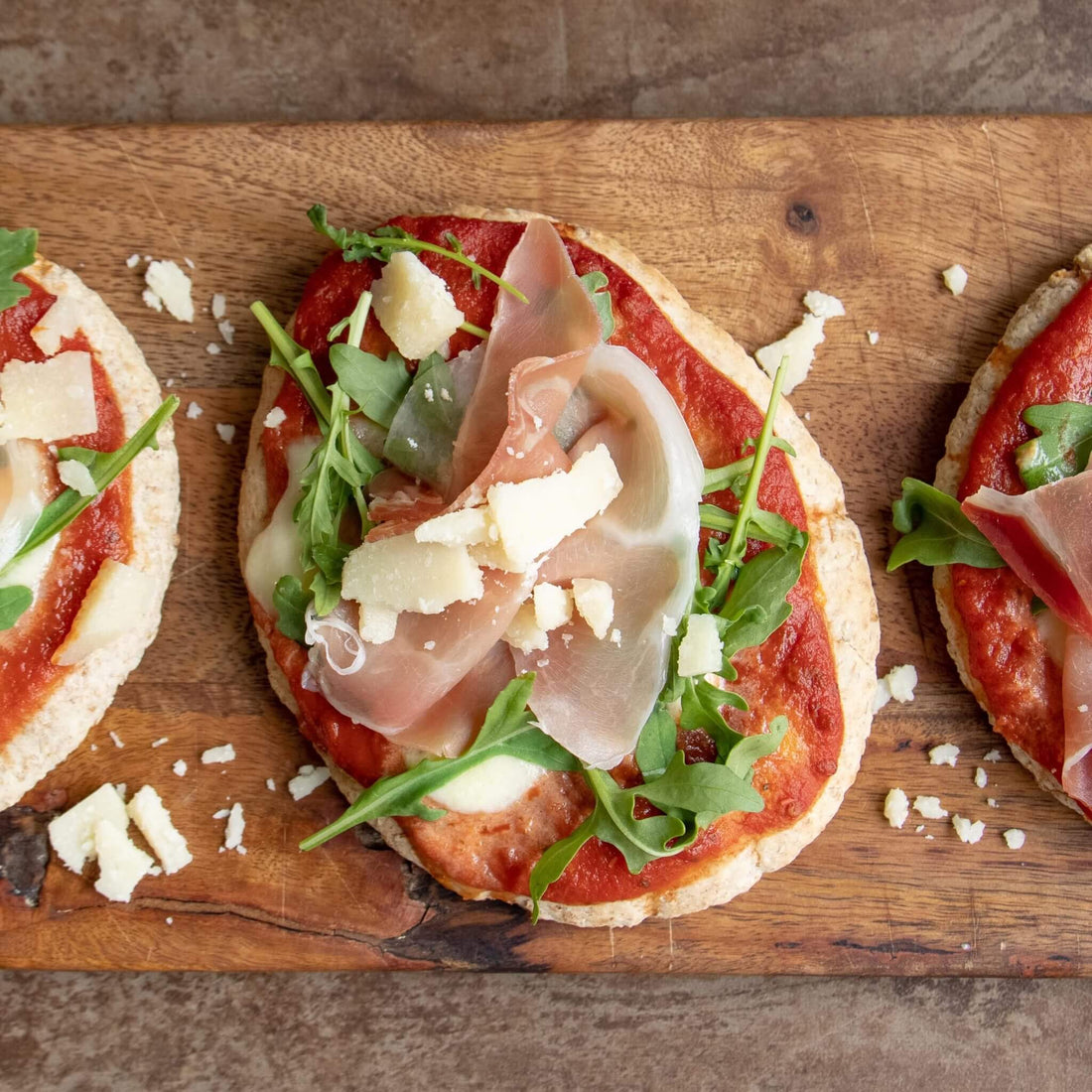 Pitza, pizza pitas, or what you may call them. These are super easy and kid-friendly pizza alternatives that take just a few minutes to make. They taste great and are so simple. Best way to make easy and fast pizza!