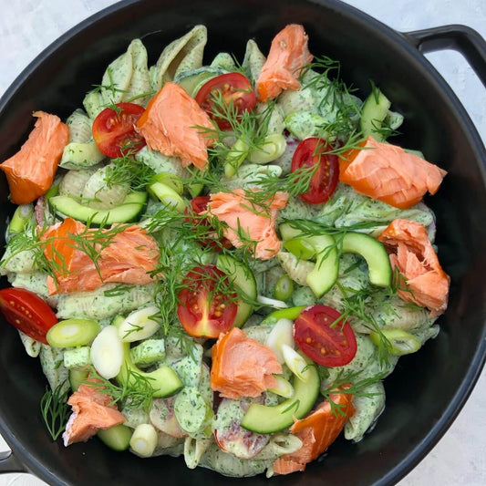 Amazing and healthy vegetarian pasta salad with salmon. Fish and pasta go great together and this is no exception. Homemade herb dressing with dill and parsley add freshness to this creamy and yummy pasta salad!